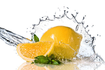 Image showing Water splash on lemon with mint isolated on white