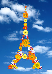 Image showing eiffel tower from flowers against blue sky