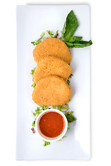 Image showing spicy cheese cakes with sauce on the plate