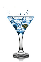 Image showing Blue alcohol cocktail with splash isolated on white