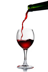 Image showing Pouring red wine into the goblet