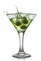 Image showing Green alcohol cocktail with splash isolated on white