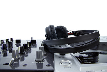 Image showing dj mixer with headphones isolated on white