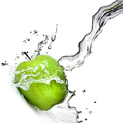 Image showing fresh water splash on green apple isolated on white