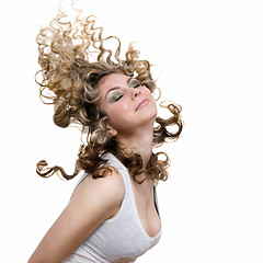 Image showing photo of sexy attractive blond with hair in air isolated on whit