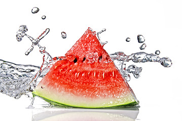 Image showing watermelon and water splash isolated on white