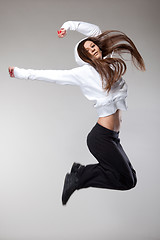 Image showing attractive jumping woman