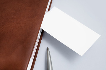 Image showing Empty business card with diary and pen