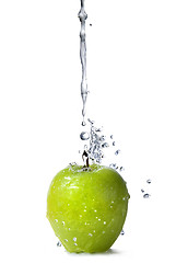 Image showing fresh water splash on green apple isolated on white