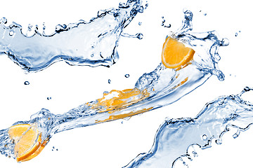 Image showing fresh water splashes and orange slices isolated on white