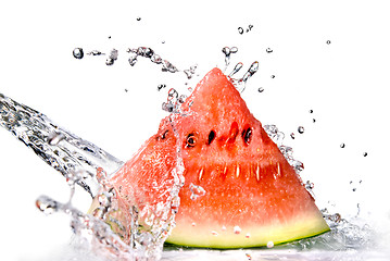 Image showing watermelon and water splash isolated on white