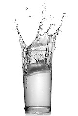 Image showing water splash in glass isolated on white