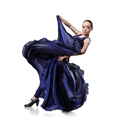 Image showing young woman dancing flamenco isolated on white 