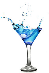 Image showing Blue curacao cocktail with splash isolated on white