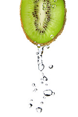 Image showing fresh water drops on kiwi isolated on white