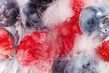 Image showing Raspberry and blackberry frozen in ice sticks