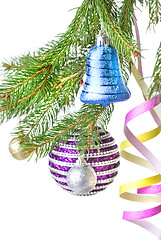 Image showing Christmas balls and decoration on fir tree branch isolated on wh