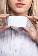 Image showing Woman hand holding empty visiting card