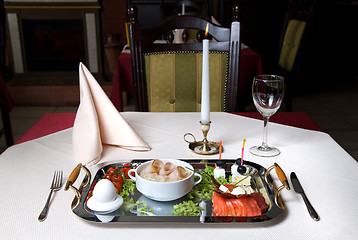 Image showing English breakfast on the plate in restaurant