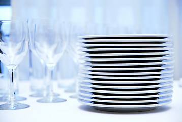 Image showing glass goblets and plates on the table