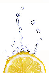 Image showing fresh water drops on lemon isolated on white