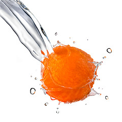 Image showing fresh water splash on orange isolated on white