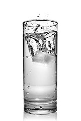 Image showing water splash in glass isolated on white