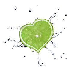 Image showing heart from lime dropped into water isolated on white