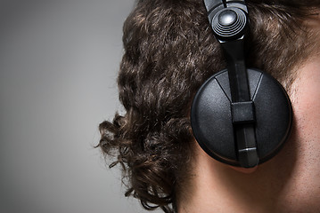 Image showing man in headphones listening to music