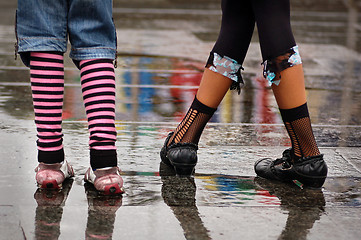 Image showing emo shoes standing under the rain