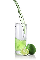 Image showing lime juice with lime isolated on white