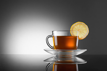 Image showing cup of hot tea with lemon