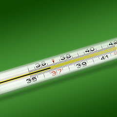 Image showing close-up thermometer on green background