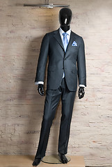 Image showing business dark grey suite on mannequin
