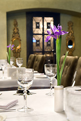 Image showing served table in restaurant with flower