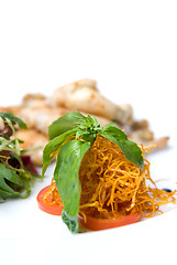 Image showing carrot and tomato with green leaves