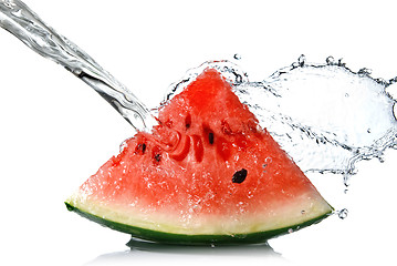 Image showing watermelon and water splash isolated on white