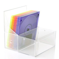 Image showing Color floppy disks in box isolated on white