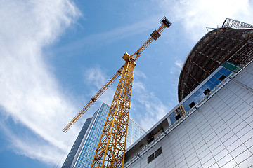 Image showing Modern building under construction against blue sky