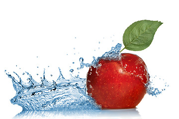 Image showing red apple with leaf and water splash isolated on white