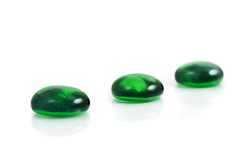 Image showing zen-like spa green shiny stones isolated on white