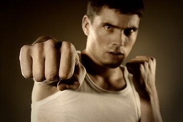 Image showing portrait of the hitting fighter
