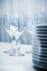 Image showing glass goblets and plates on the table