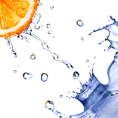 Image showing fresh water splash and drops on orange isolated on white