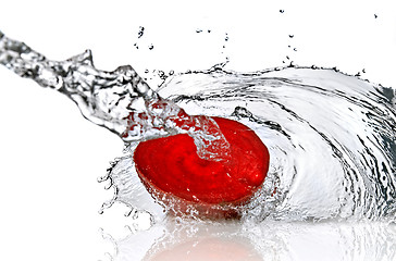 Image showing red beet with water splash isolated on white