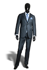 Image showing business dark grey suite on mannequin isolated on white