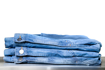 Image showing blue jeans in store isolated on white