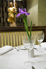 Image showing served table in restaurant with flower