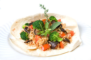 Image showing risotto with vegetables isolated on white