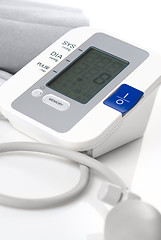 Image showing Automatic digital blood pressure monitor isolated on white